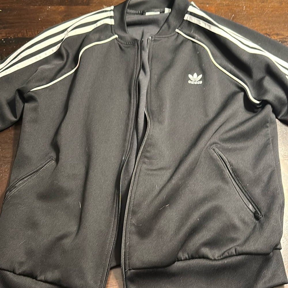 Adidas black with white strips on arms, jogger zip up